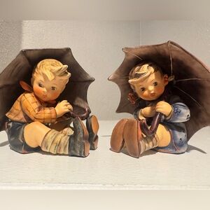 Vintage Hummel Collectibles of the "Umbrella Boy" and “Umbrella Girl"
